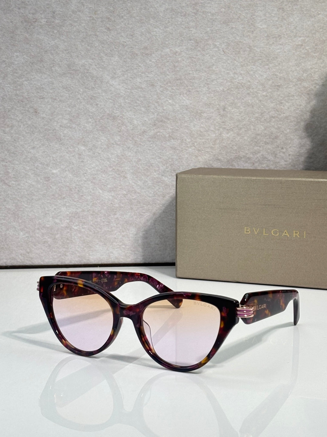 Bvlgari tortoise eyeglass frames with gold logo detail on temple arms