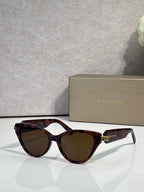Bvlgari tortoise brown cat-eye sunglasses with gold logo on temples
