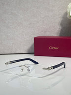 Eyeglass frame with clear lenses, silver-tone metal with blue temple inserts