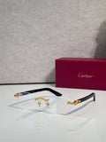 Cartier glasses with clear lenses, gold-tone metal frame, and blue temple accents