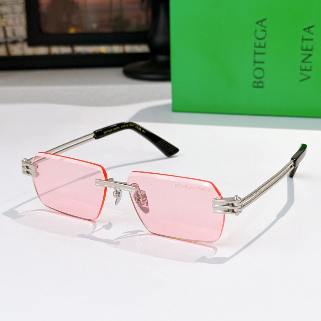 Bottega Veneta glasses with pink tinted lenses, silver frame, red trim, tortoise details.