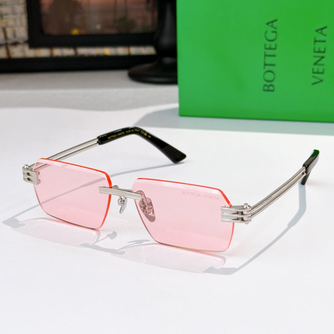 Bottega Veneta glasses with pink tinted lenses, silver frame, red trim, tortoise details.