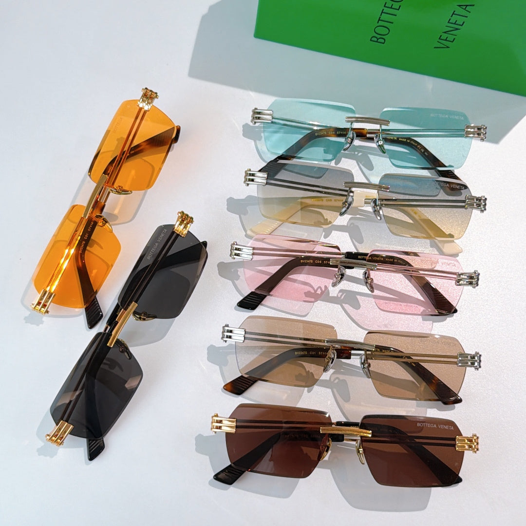 Bottega Veneta glasses assortment showing several colored frames and tinted lenses.