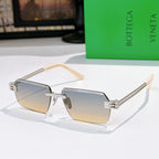 Bottega Veneta glasses with gradient brown lenses, silver frame, light beige temple tips.