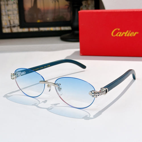 Light blue round sunglasses with gold-tone frames and jeweled temple detail