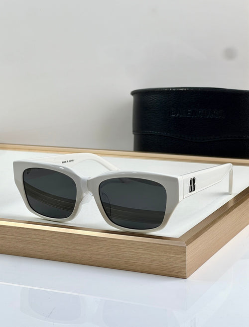 Balenciaga sunglasses with white frame, black lenses, black temple logo