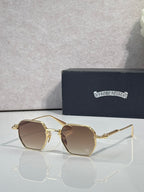 Chrome sunglasses with brown lenses and gold-toned frame, front view