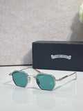 Chrome sunglasses with teal square lenses and silver frame, front view