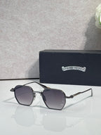 Chrome sunglasses with dark gray square lenses and silver frame, angled front view