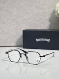 Black and silver rectangular eyeglasses with clear lenses and metal temple arms