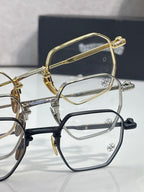 Gold, silver, and black eyeglasses with clear rectangular lenses