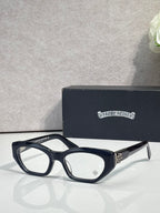 Chrome glasses with dark frame, round-square lenses, and slim temples.