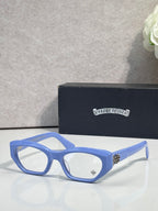 Chrome glasses with blue frame, round-square clear lenses, and metal side details.