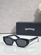 Black and clear glasses with dark lenses and chrome metal temples