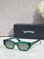 Green and clear acetate glasses with dark green lenses and chrome arms