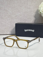 Chrome eyeglasses with olive-gold frame and clear lenses, metal temple tips