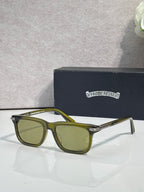 Green-tinted eyeglasses with dark frame and rectangular lenses