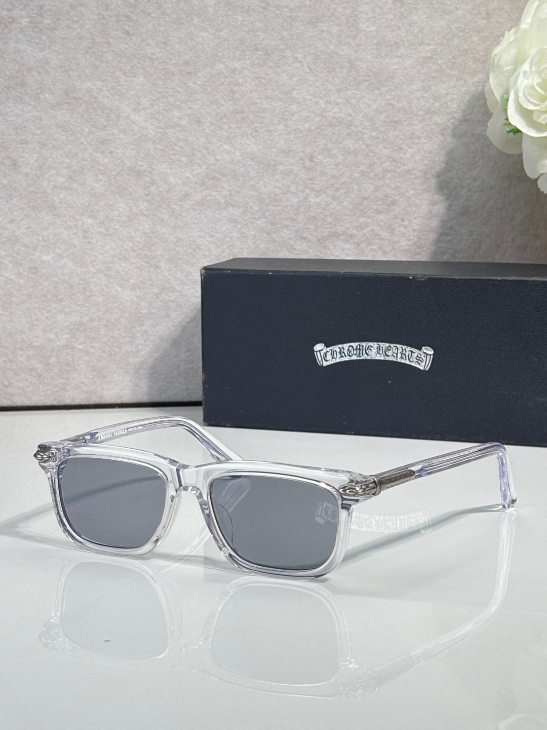 Clear eyeglasses with gray lenses and rectangular frames