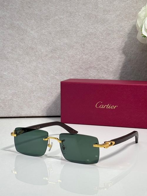 Sunglasses with green tinted lenses, gold metal frame and dark arms