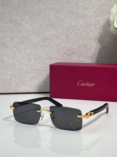 Sunglasses with gray tinted lenses, gold metal frame and dark arms