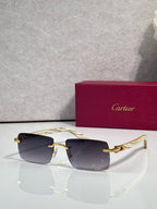 Sunglasses with amber tinted lenses, gold frame and light arms