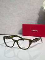 Prada dark green full-rim eyeglasses with clear lenses and curved acetate frame