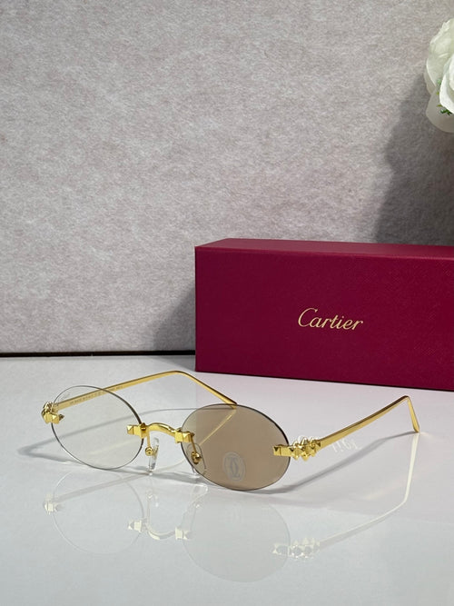 Cartier round sunglasses with gold frame and gray tinted lenses