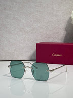 Silver metal-frame glasses with teal tinted lenses and small jeweled hinge hardware