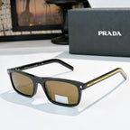 Prada sunglasses with black frame and amber-brown tinted lenses, metal temples with logo