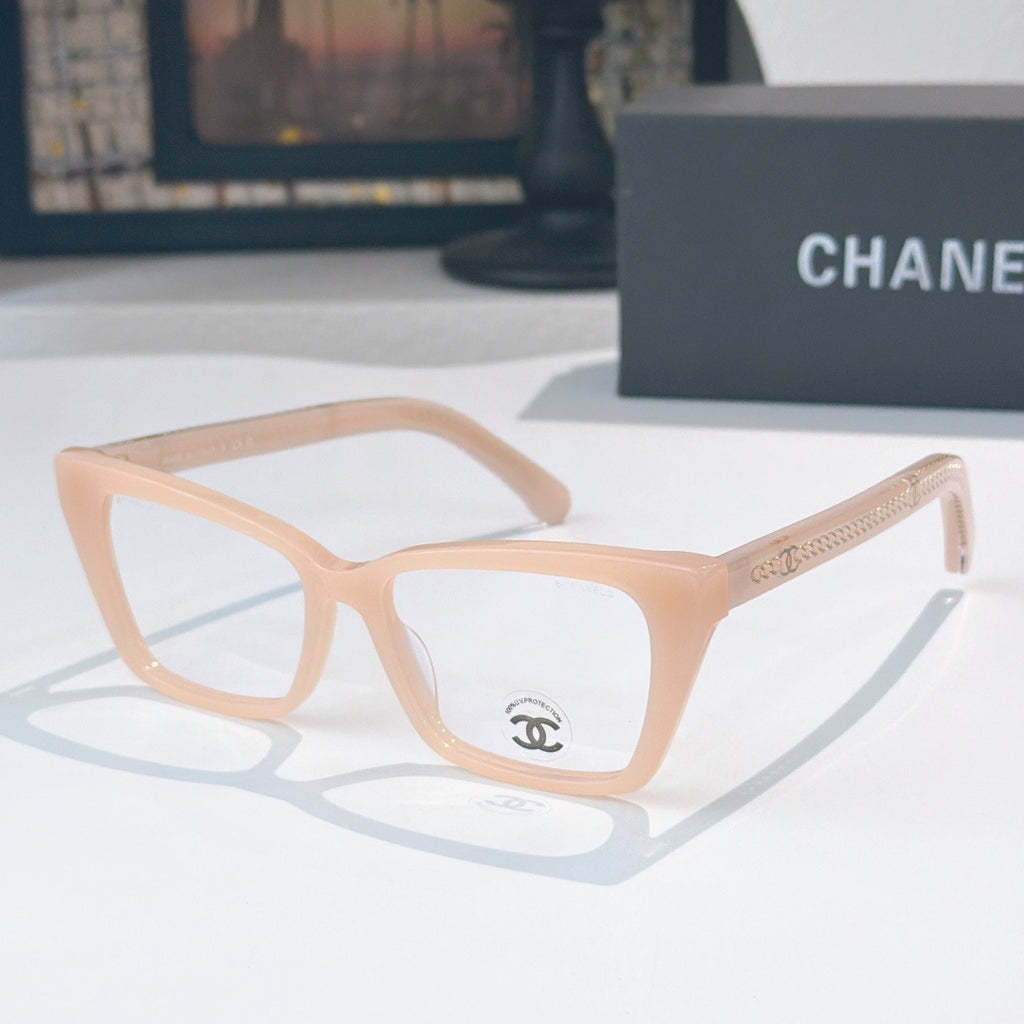 Light beige square eyeglasses with clear lenses and emblem on temple