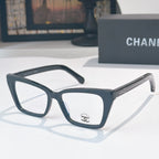 Dark blue-black square eyeglasses with clear lenses and textured temple trim
