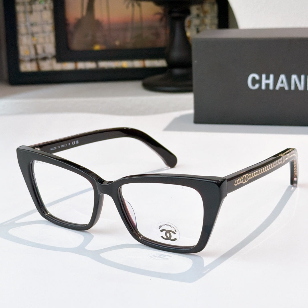 Black square eyeglasses with clear lenses, metal chain detail on temples