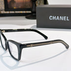 Black square eyeglasses with clear lenses and chain-texture detail on arm
