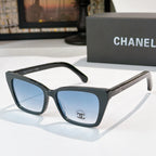 Chanel sunglasses with black frames and blue tinted lenses