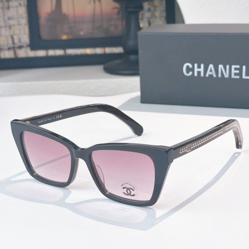 Chanel sunglasses with dark frames and pink tinted lenses