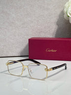Cartier eyeglasses with gold-tone frame and clear lenses, round rectangular shape