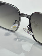 Cartier eyeglasses close-up of black temple arm and clear lenses