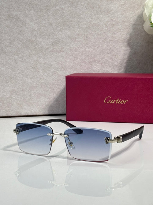 Cartier eyeglasses, black frame with light-blue gradient lenses and gold hinge detail