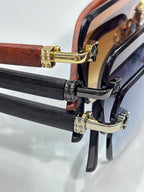 Cartier sunglasses temple close-up with gold-tone and black decorative links