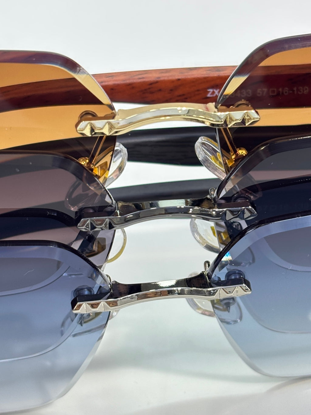 Cartier sunglasses front close-up showing layered blue and brown gradient lenses