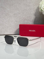 Black sunglasses with rectangular frames and dark lenses