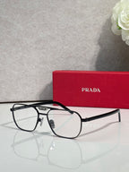 Black eyeglasses with rectangular frames and clear lenses