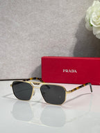 Tortoise and black sunglasses with rectangular frames and dark lenses