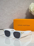 Louis Vuitton sunglasses with white frames, dark lenses, and gold temple detailing