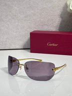 Cartier sunglasses with gold frame and light purple gradient shield lenses