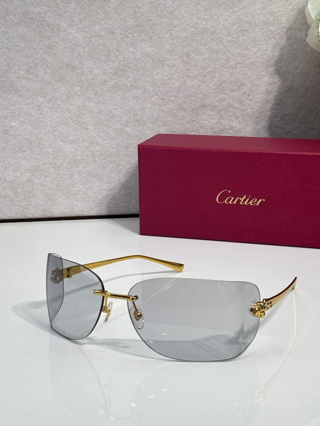 Cartier sunglasses, gold metal frame with large smoky gradient lenses