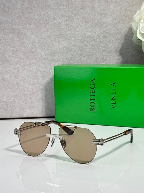Bottega Veneta sunglasses, gold-tone frame with light brown tinted lenses