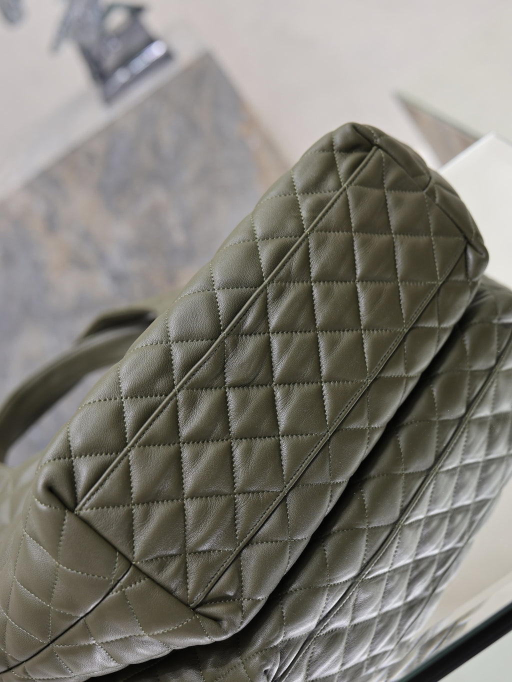 YSL quilted olive green bag corner with stitched diamond pattern