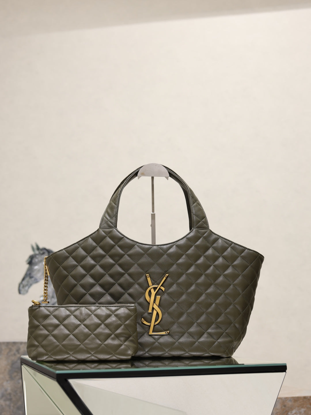 YSL quilted tote bag in dark olive green with YSL logo and top handles