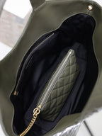 YSL tote bag interior view with quilted lining and zip pocket